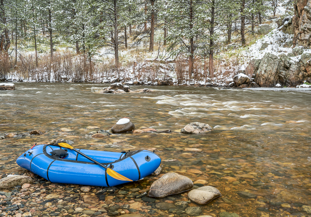 inflatable packraft on a mountain river