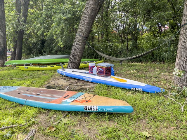 Stand up paddleboards and kayaks at Kaw Point Park, confluence of Missouri and Kansas Rivers.
