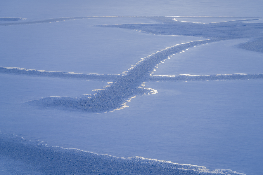 patterns of ice and snow on a froen lake - Horsetooth Reservoir in northern Colorado